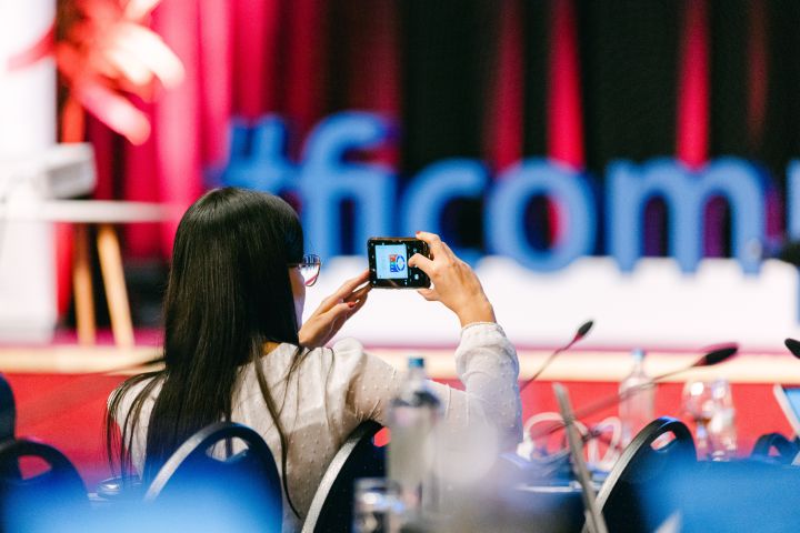 Event participant taking photos